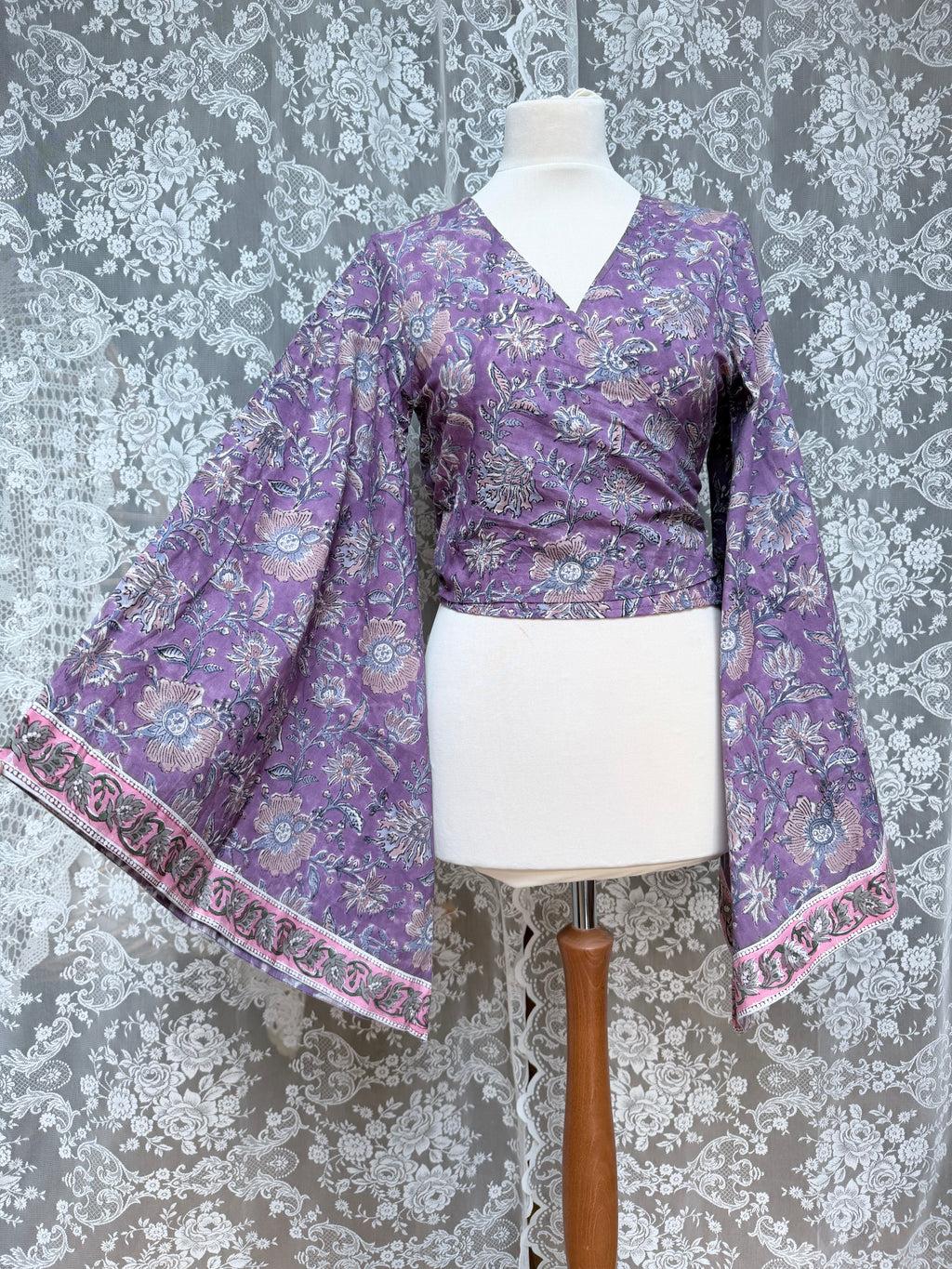 The Sofiya: Bell Sleeve Block Print Wrap Blouse in Amethyst Purple