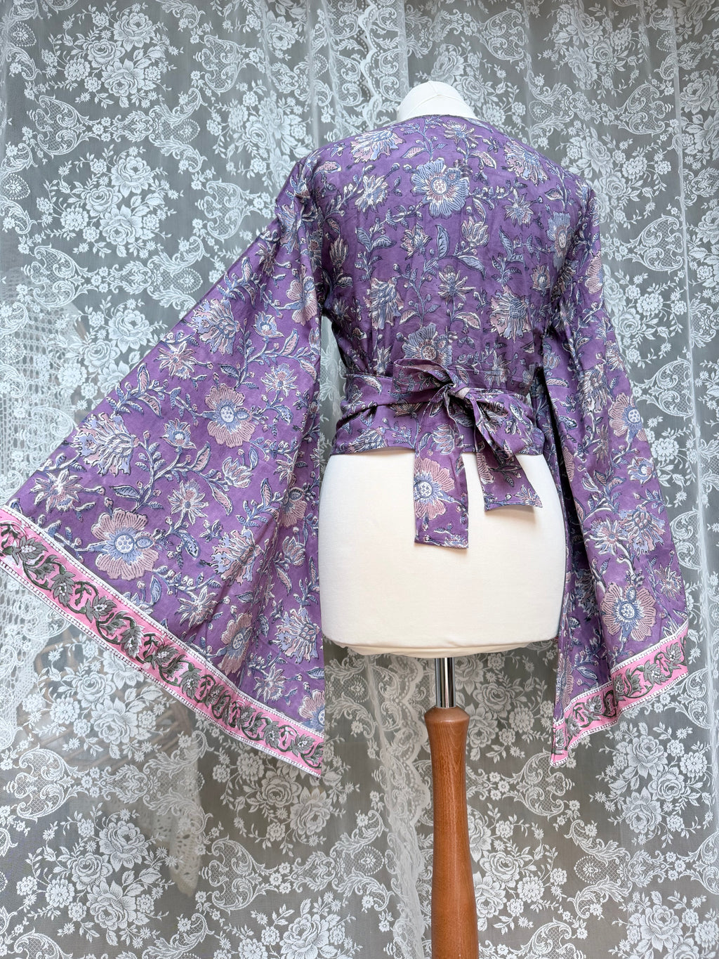 The Sofiya: Bell Sleeve Block Print Wrap Blouse in Amethyst Purple