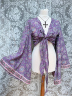 The Sofiya: Bell Sleeve Block Print Wrap Blouse in Amethyst Purple